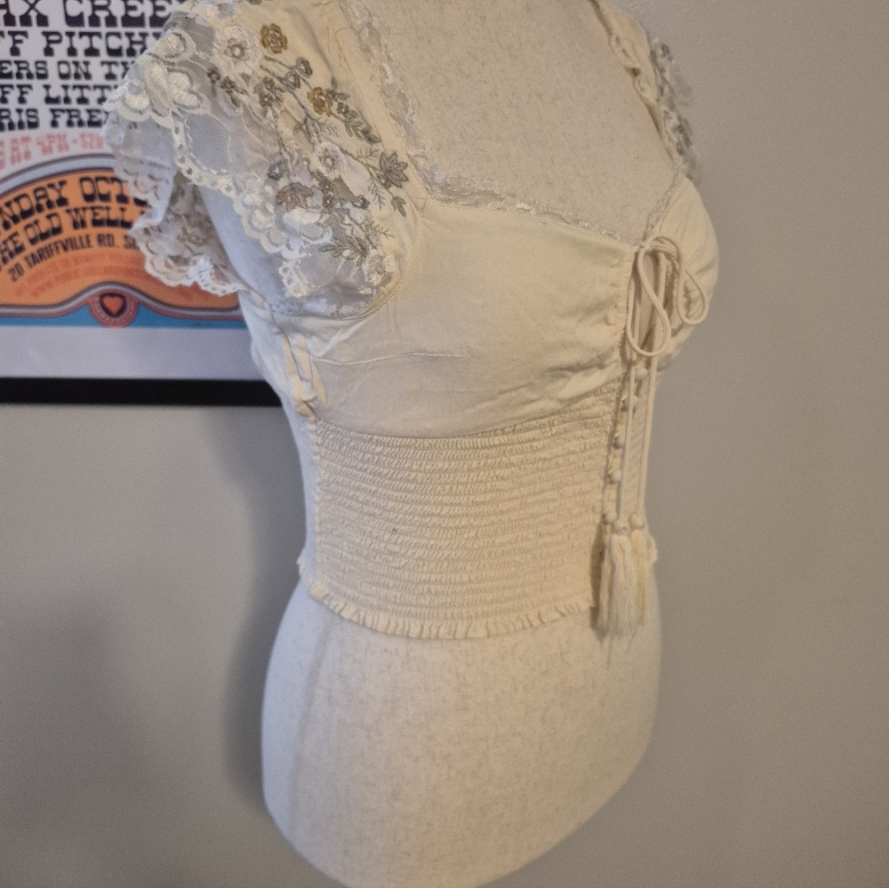 Cream Lace Women's Ruched Blouse Floral Lace Cap Sleeves Tassel Tie Bodice Sexy